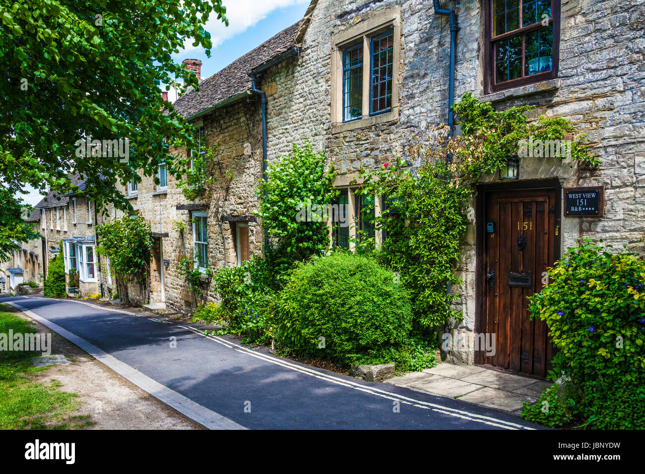 Pretty Cotswold stone cottages dans le village de Burford Cotswolds dans l'Oxfordshire. Banque D'Images