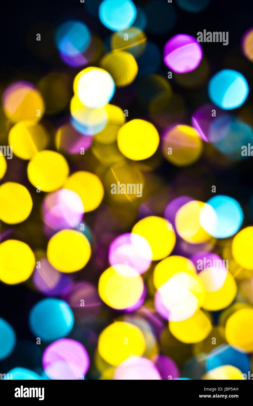 Bokeh Glitter Confetti sur fond noir Banque D'Images