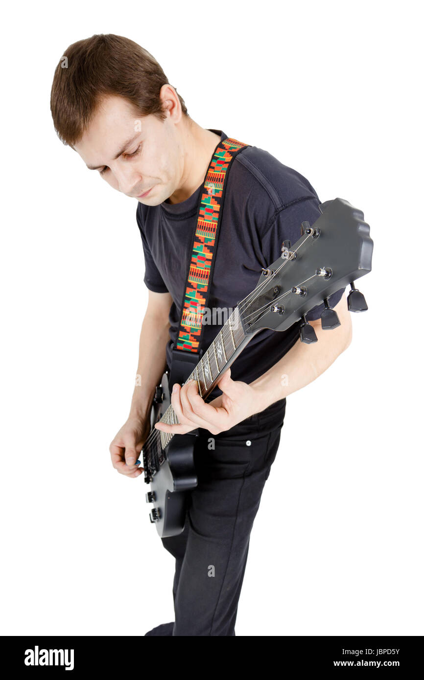 Homme avec une guitare sur un fond blanc. Interprète avec une guitare électrique Banque D'Images