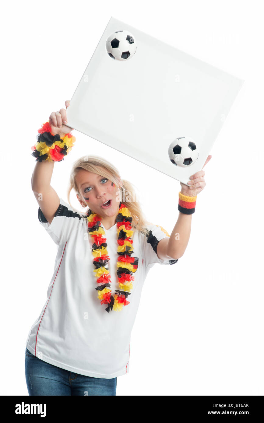 Blonder football fan tenant une affiche Banque D'Images