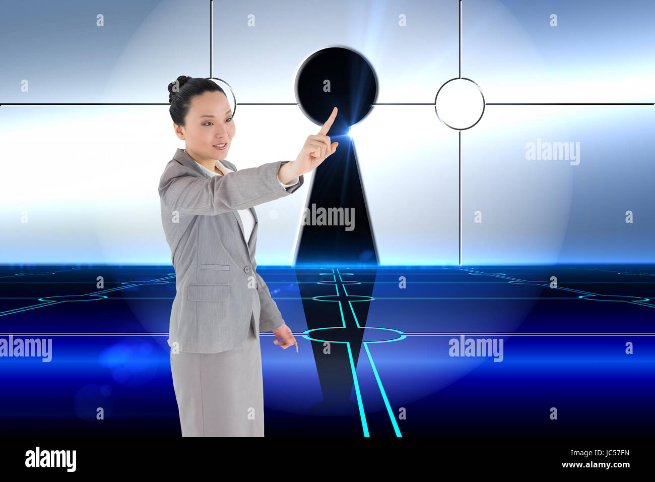 Composite image of asian businesswoman pointing Banque D'Images