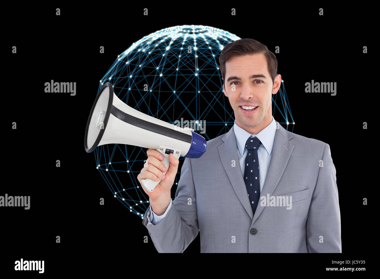 Portrait of businessman holding a megaphone Banque D'Images