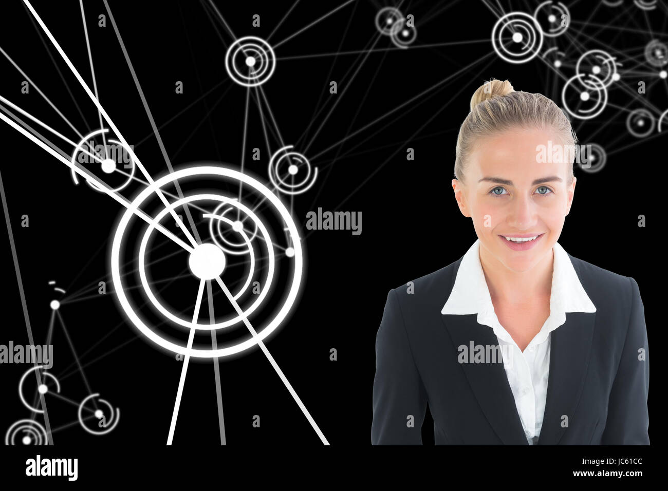 Image composite de blonde usinesswoman holding tablet Banque D'Images