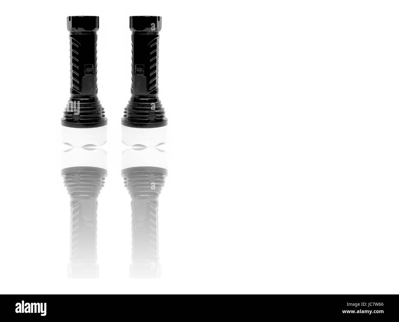 Les enfants jouet batterie torche, isolé sur blanc. Moins est plus. Banque D'Images