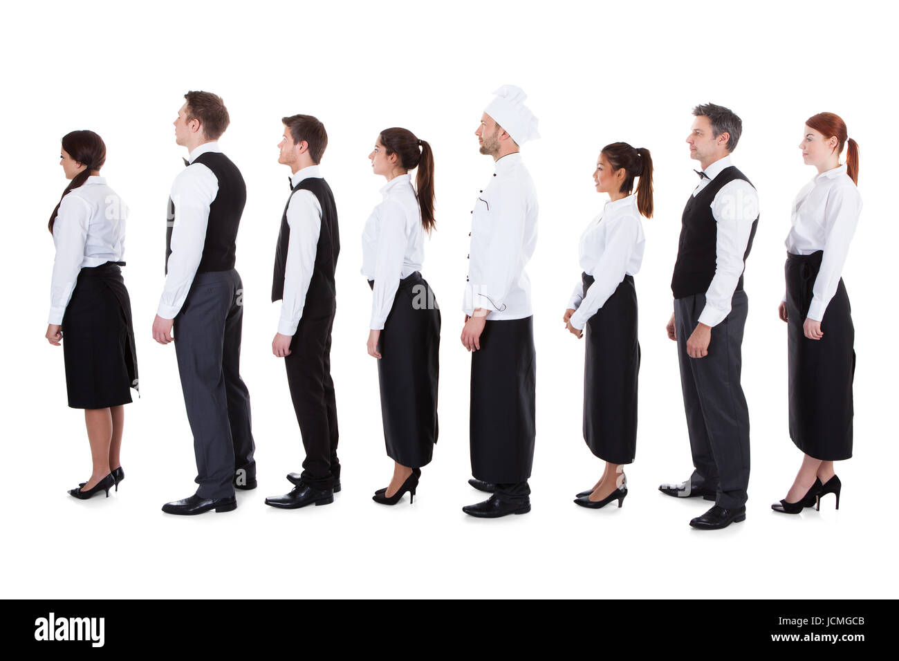 Les serveurs et serveuses debout dans la file d'attente. Isolated on white Banque D'Images