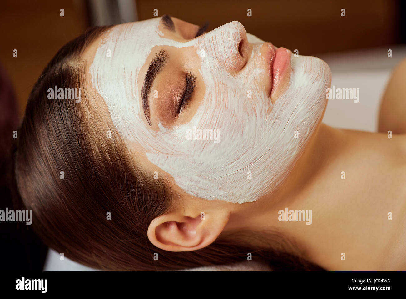 Close-up of young woman with face mask on face Banque D'Images