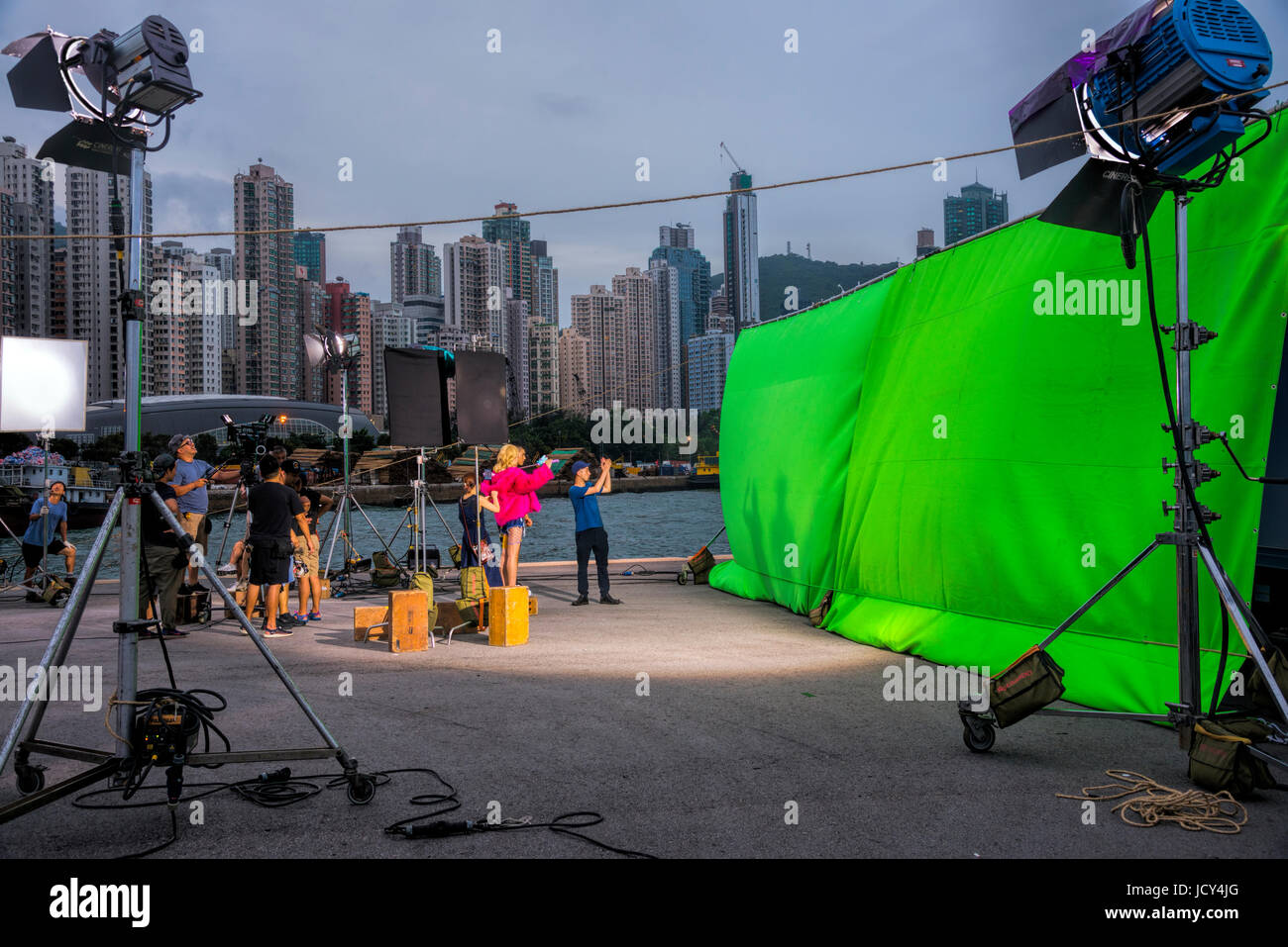 Film Asiatique d'être filmé devant un écran vert, Hong Kong, Chine. Banque D'Images