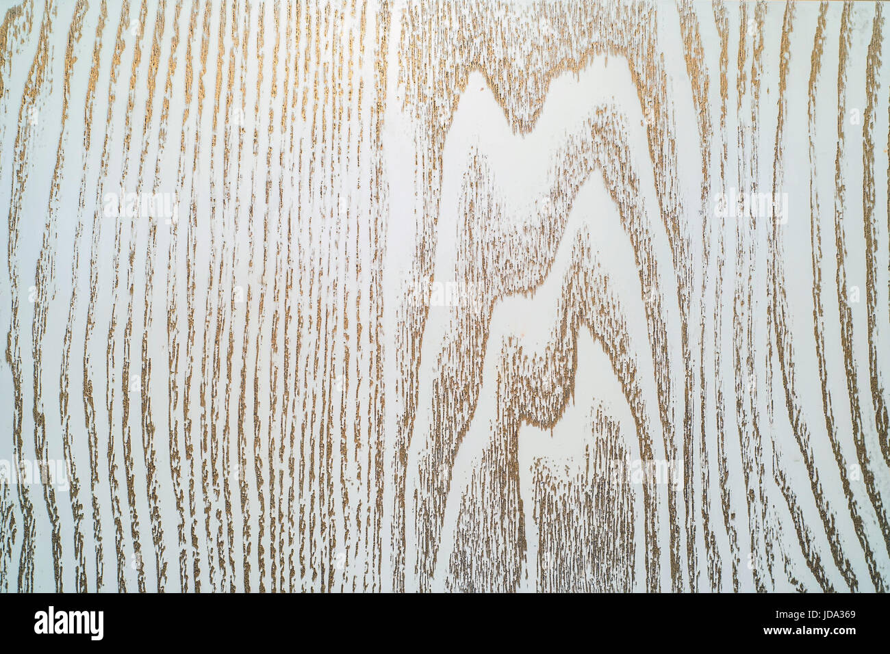 La texture de vieille planche peinte avec de la peinture blanche ou crème et patine bronze ou d'or Banque D'Images