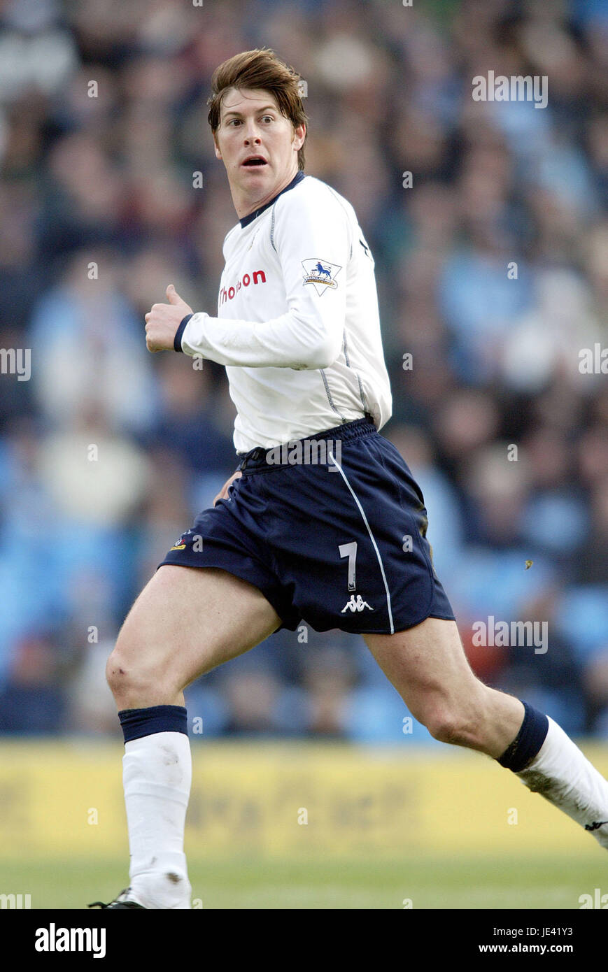 DARREN ANDERTON Tottenham Hotspurs FC CITY OF MANCHESTER STADIUM MANCHESTER EN ANGLETERRE 25 Janvier 2004 Banque D'Images