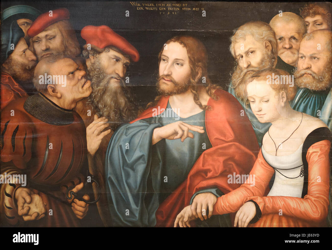 'Christ et l'Adulteress' de Lucas Cranach l'ancien dépeint la scène biblique où le Christ intervient pour empêcher la lapidation d'une femme accusée d'adultère, mettant en évidence les thèmes de la miséricorde et du pardon. Banque D'Images
