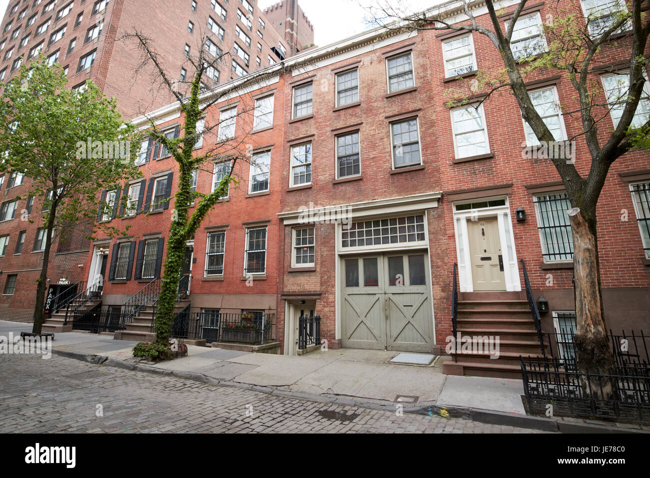 Des maisons de brique rouge avec sous-sol appartements Greenwich village New York City USA Banque D'Images
