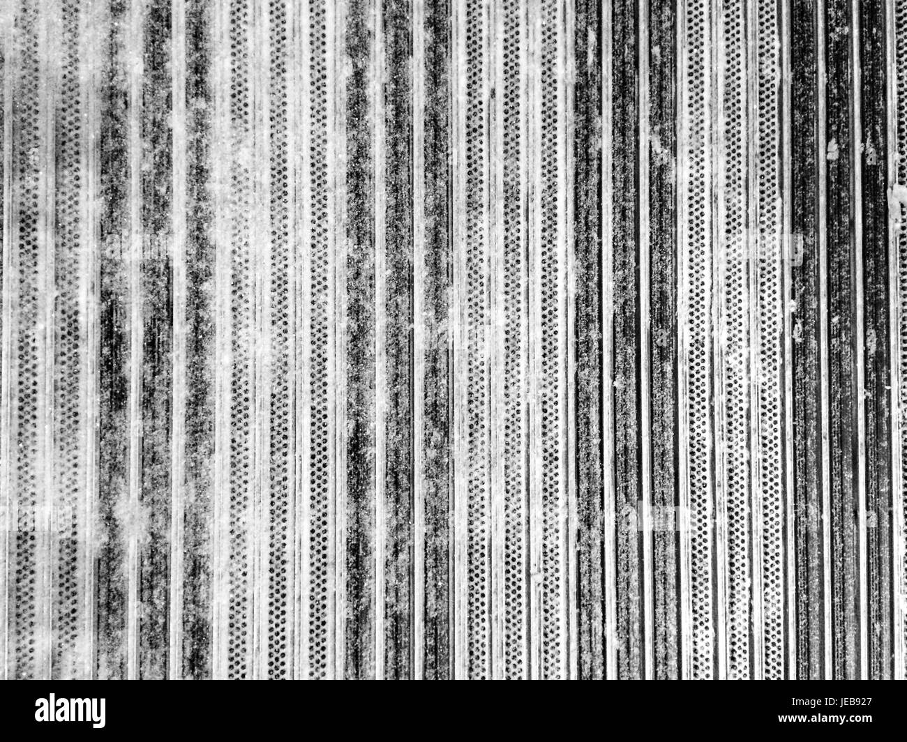 La voie d'entrée pour le nettoyage de chaussures sous la neige Banque D'Images