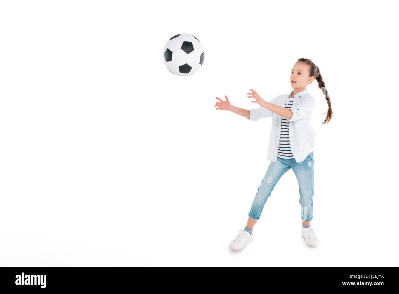 Little girl with soccer ball isolated on white, enfants sport concept Banque D'Images