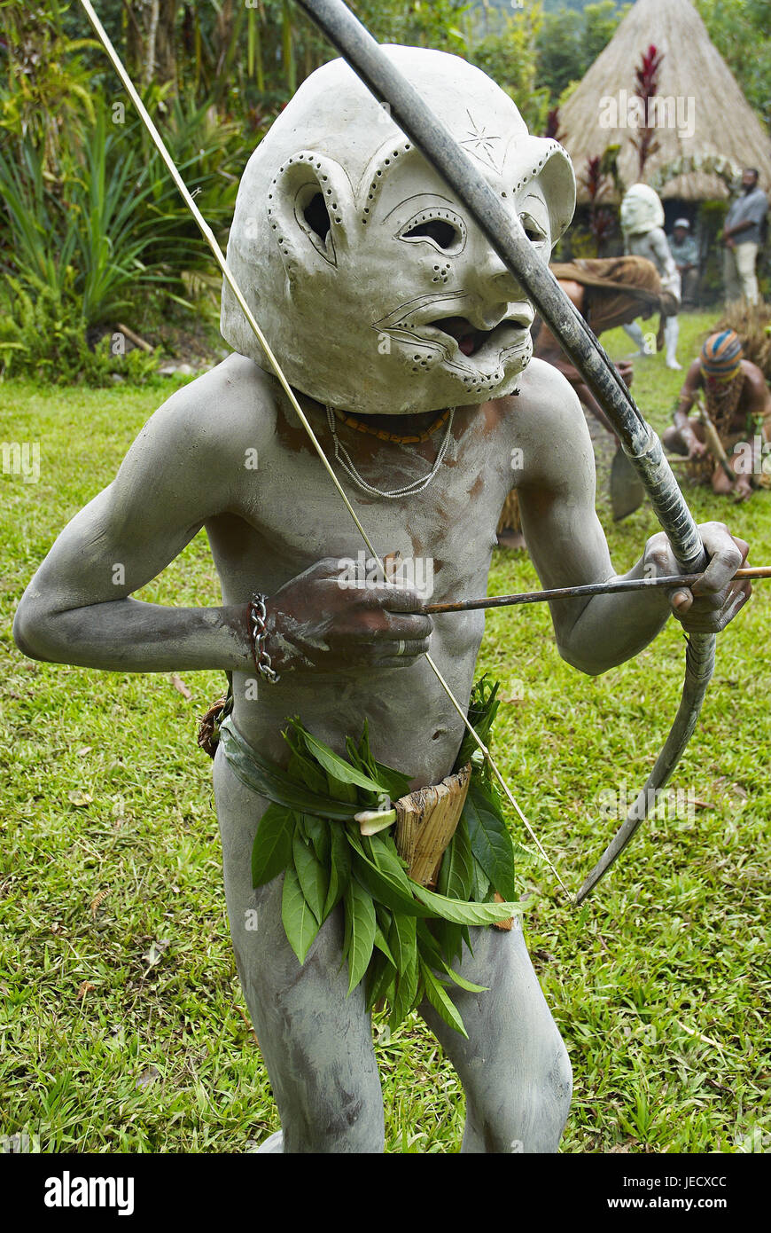 La Papouasie-Nouvelle-Guinée, membre de l'Huli de la souche avec la flèche et l'arc, Banque D'Images