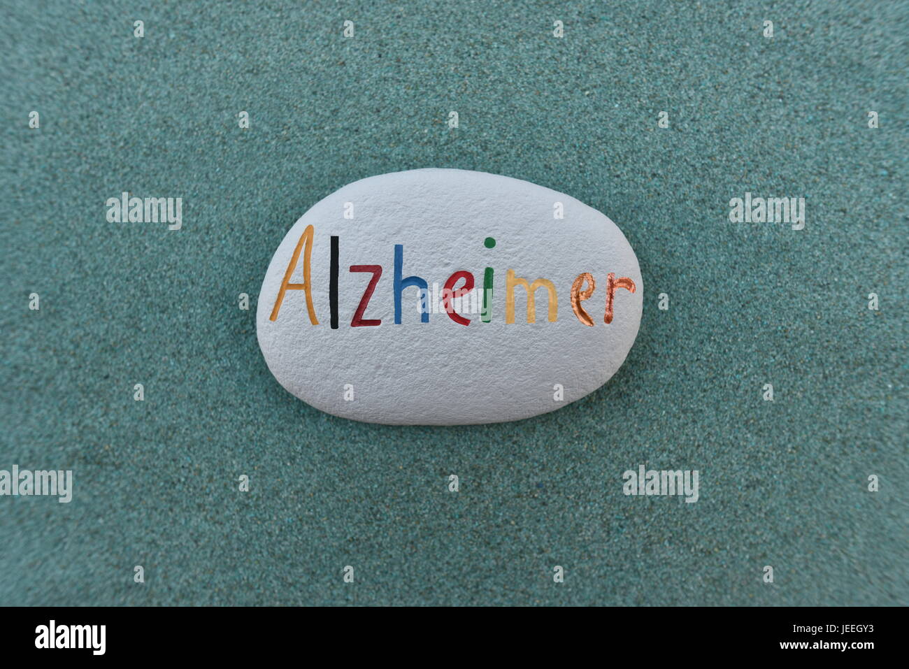 La maladie d'Alzheimer nom peint sur une pierre Banque D'Images