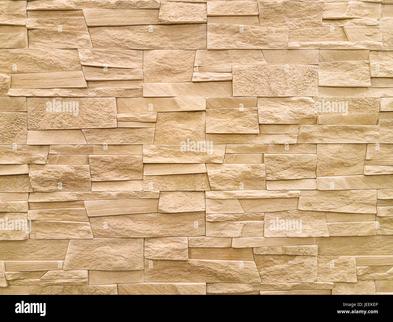 Mur de pierre de grès moderne de texture de fond. Banque D'Images