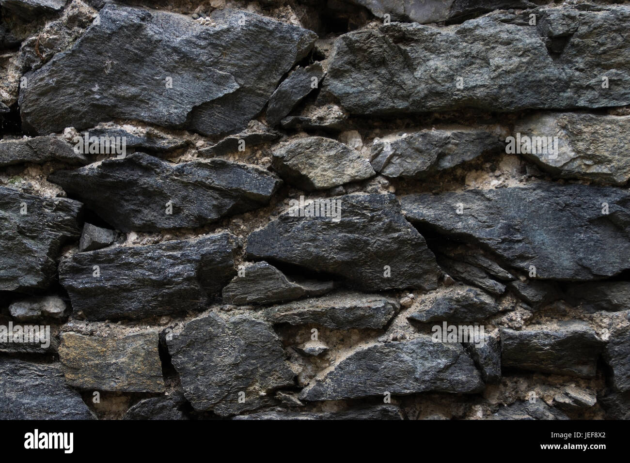 Mur de pierre d'un château dans l'Europe., Steinmauer von Burg dans Europa. Banque D'Images