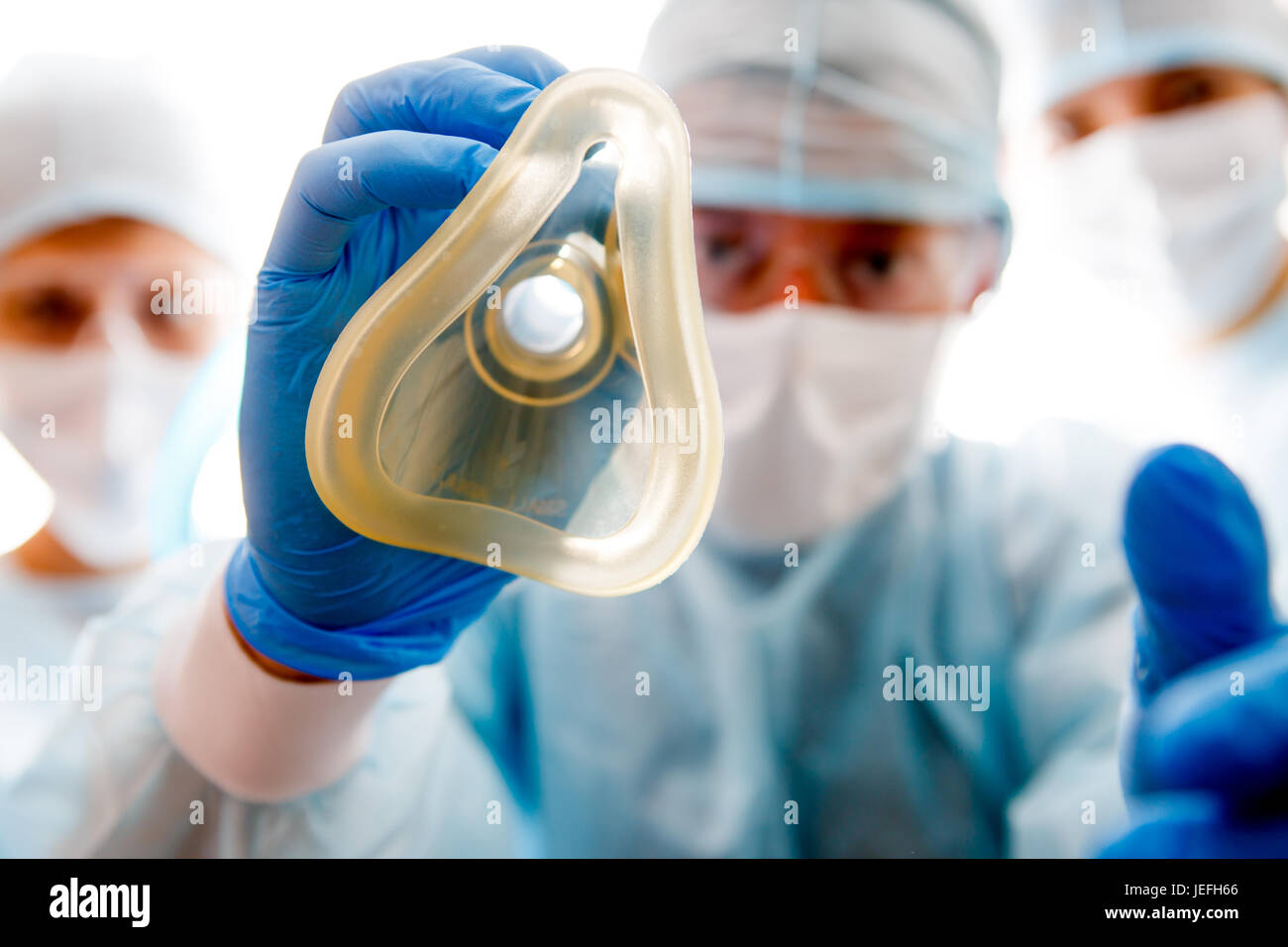 Équipe de médecins avec masque Banque D'Images