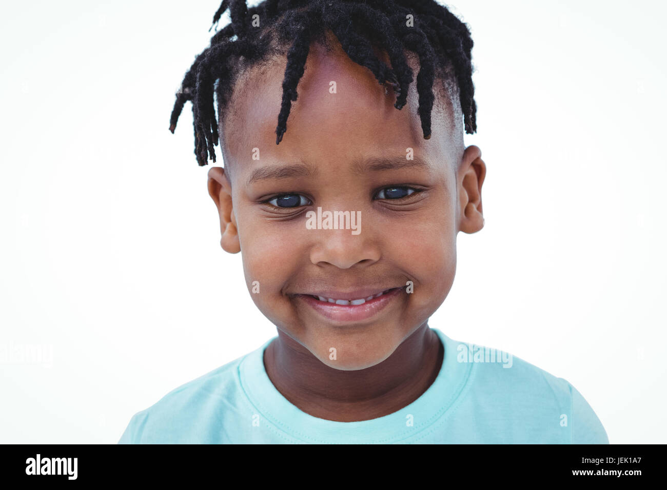 Cute boy smiling at the camera Banque D'Images