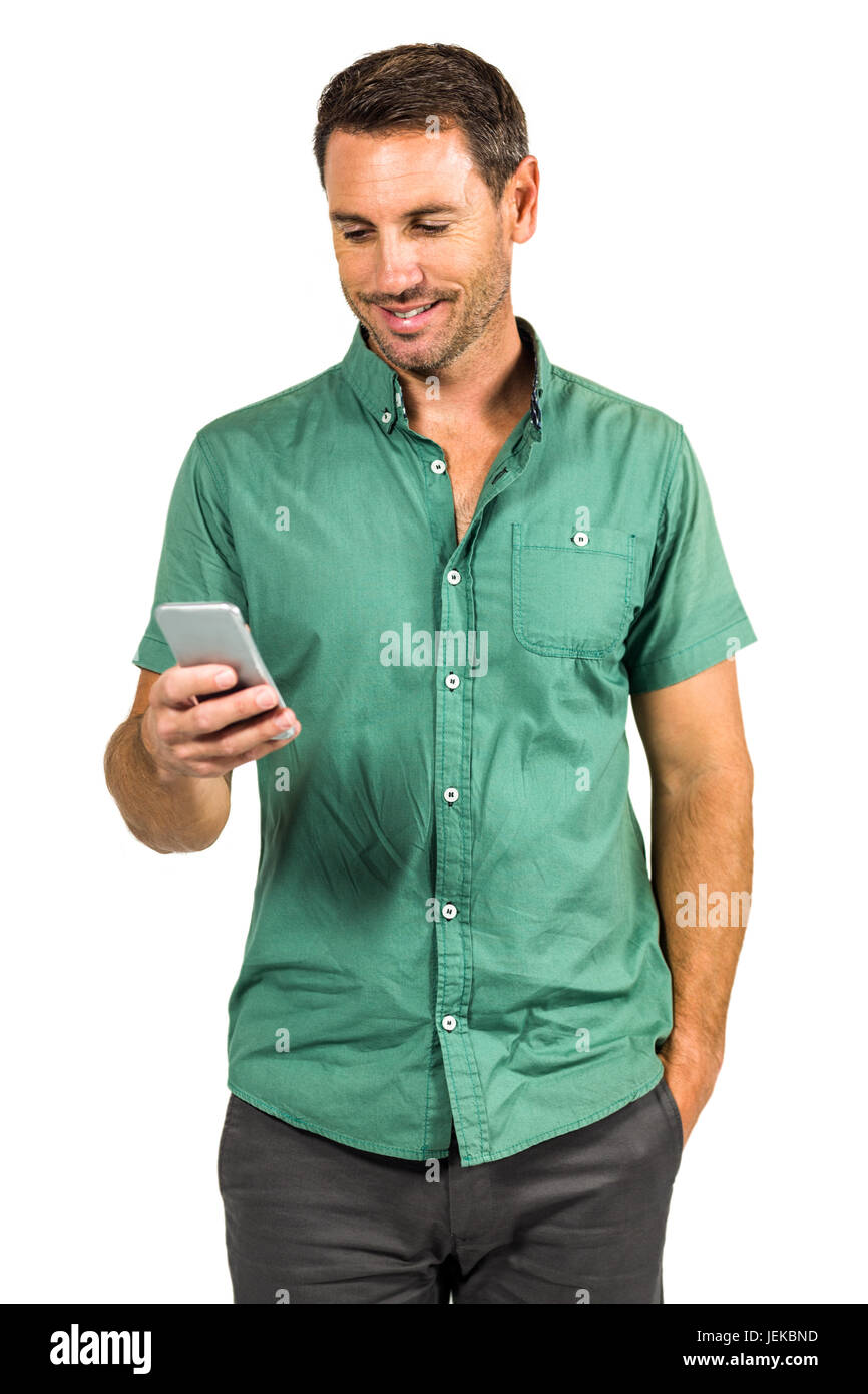 Smiling man with smartphone Banque D'Images