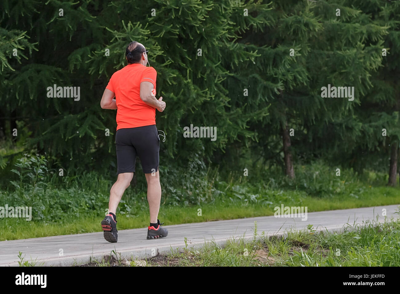 Les jeunes courir sur le parc de la ville, la forme physique, la santé. Banque D'Images