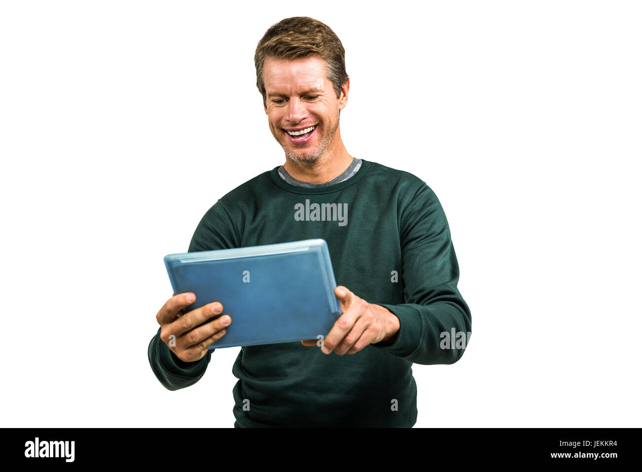 Smiling man using tablet Banque D'Images