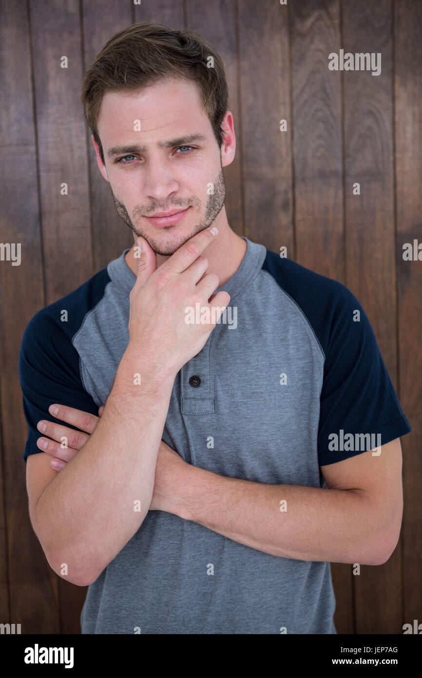 Beau hipster with hand on chin Banque D'Images