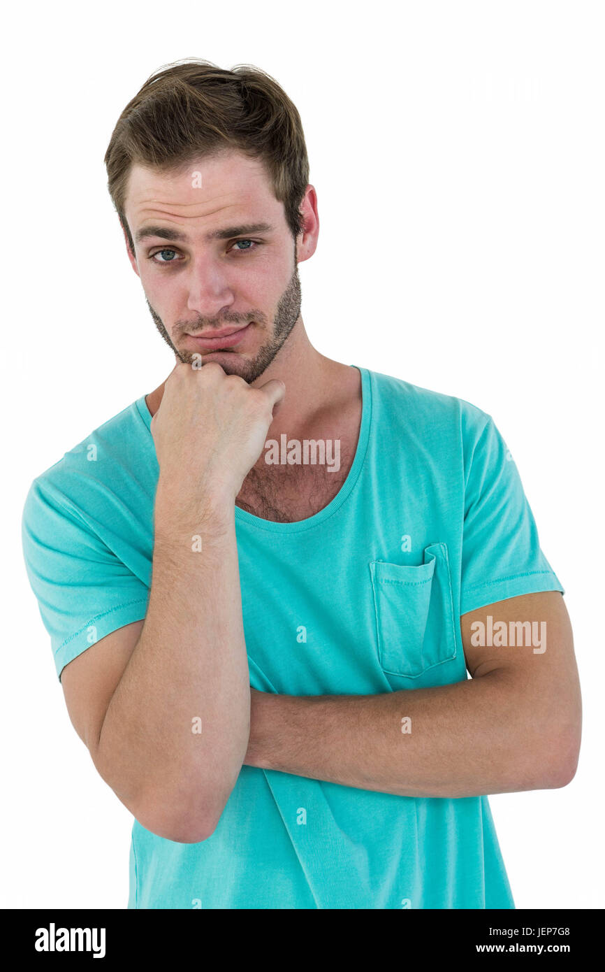Hipster man posing with hand on chin Banque D'Images