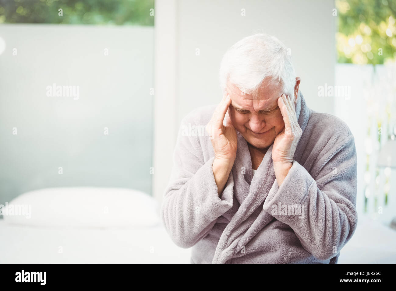 Man avec maux de tête Banque D'Images