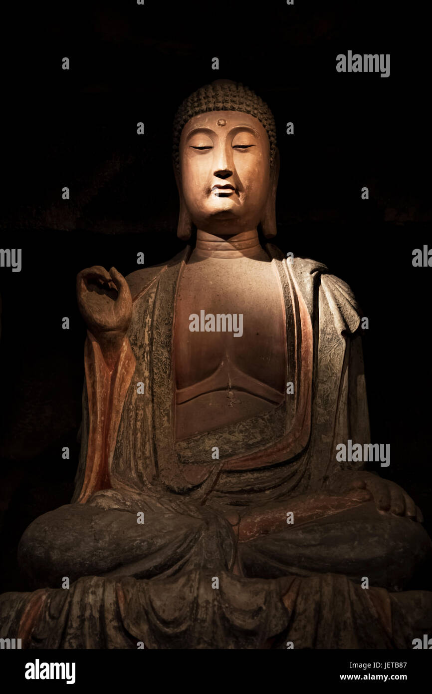 Bouddha en pierre et des reliques de la Zhongshan grottes, en Zichang County affiche au Musée d'histoire du Shaanxi à Xi'an, province du Shaanxi en Chine Banque D'Images