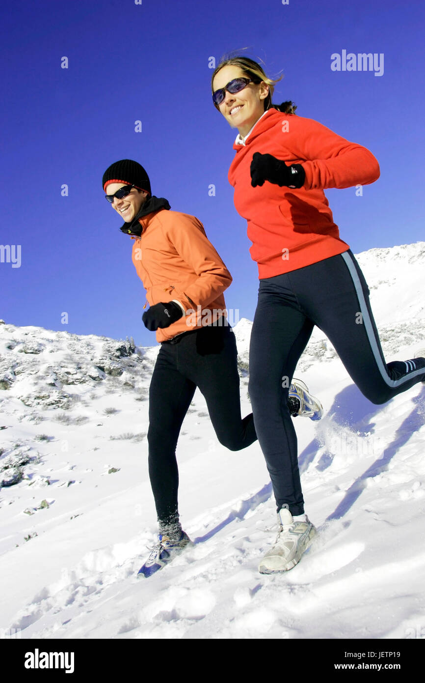 L'homme et la femme jog en hiver, Mann und Frau joggen im Winter Banque D'Images
