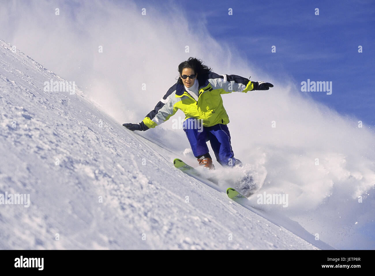 Skieur dans l'action, en Skifahrerin Aktion Banque D'Images