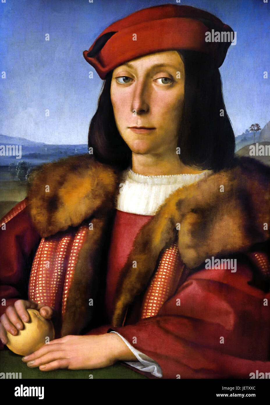 Portrait d'un jeune homme avec un Apple (Francesco Maria Della Rovere),peint 1504. Raphael - Raffaello Sanzio da Urbino 1483 -1520 est un peintre italien et architecte de la Haute Renaissance Italie Banque D'Images