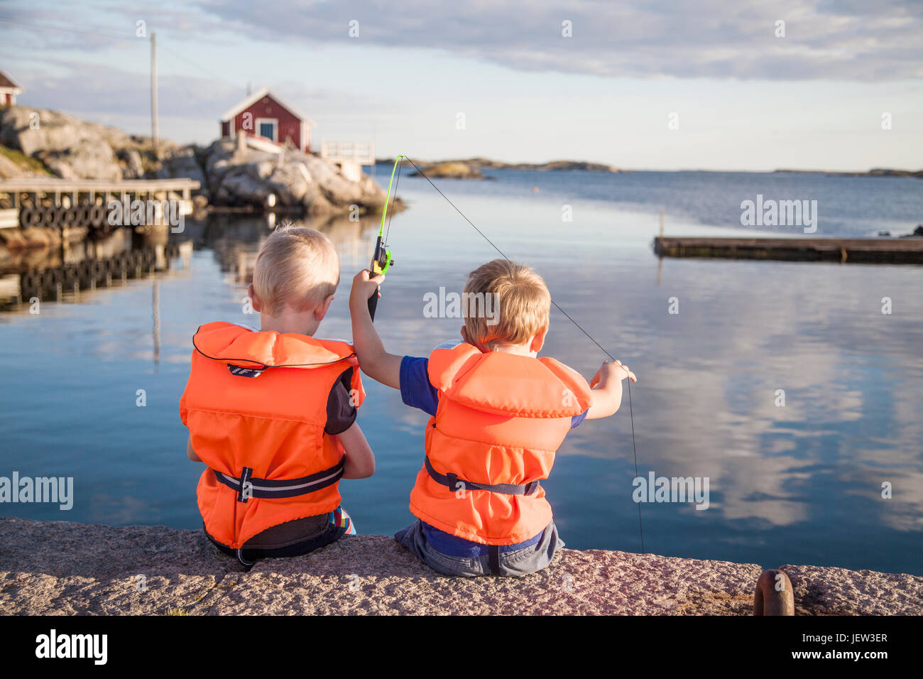 Garçons de pêche Banque D'Images