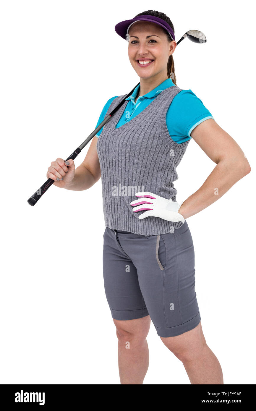 Joueur de golf posant avec golf club Banque D'Images