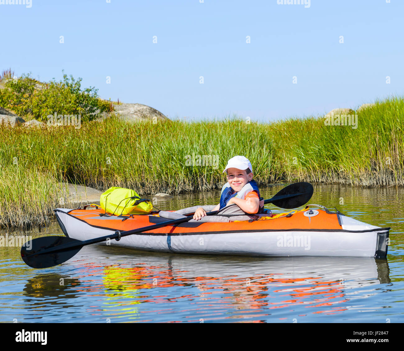 Garçon de kayak Banque D'Images