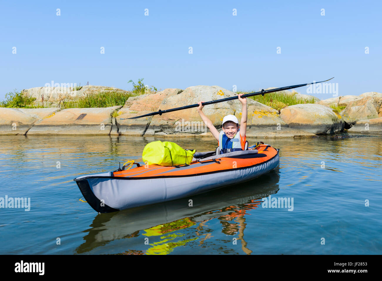 Garçon de kayak Banque D'Images