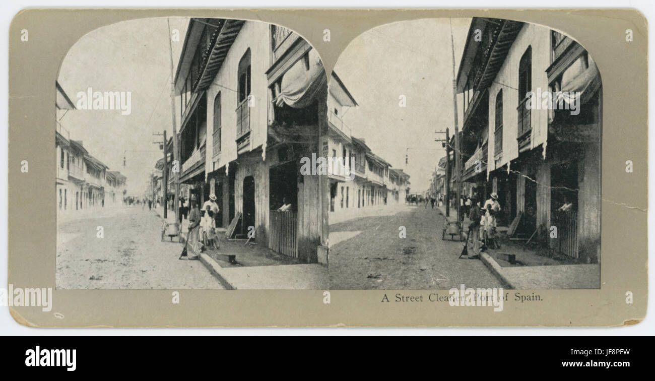 Photographie franche d'un nettoyeur de rue à Port of Spain, Trinité-et-Tobago, reflétant la vie urbaine et les activités quotidiennes de la ville. Banque D'Images