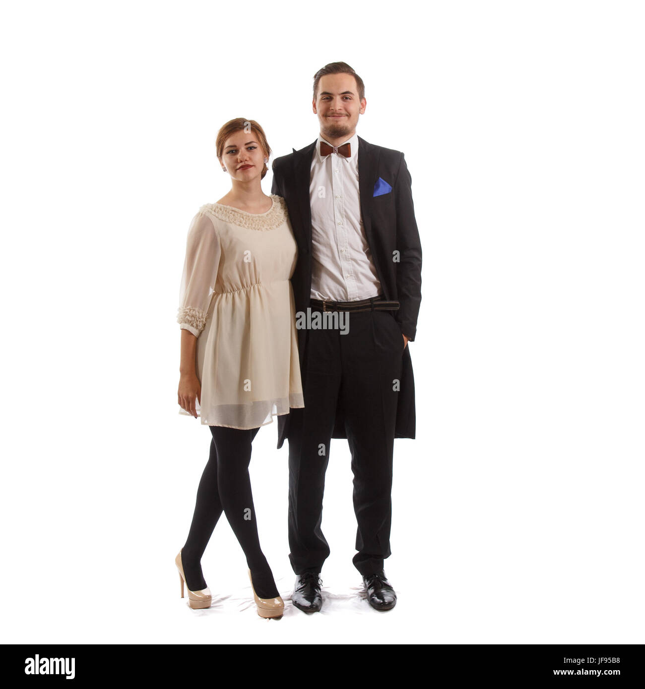 Jeune couple debout sur un fond blanc Banque D'Images