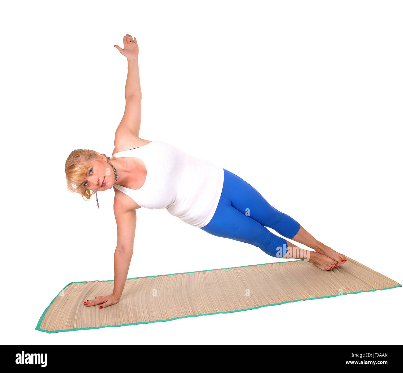 Formateur de Yoga montrant l'exercice pose. Banque D'Images