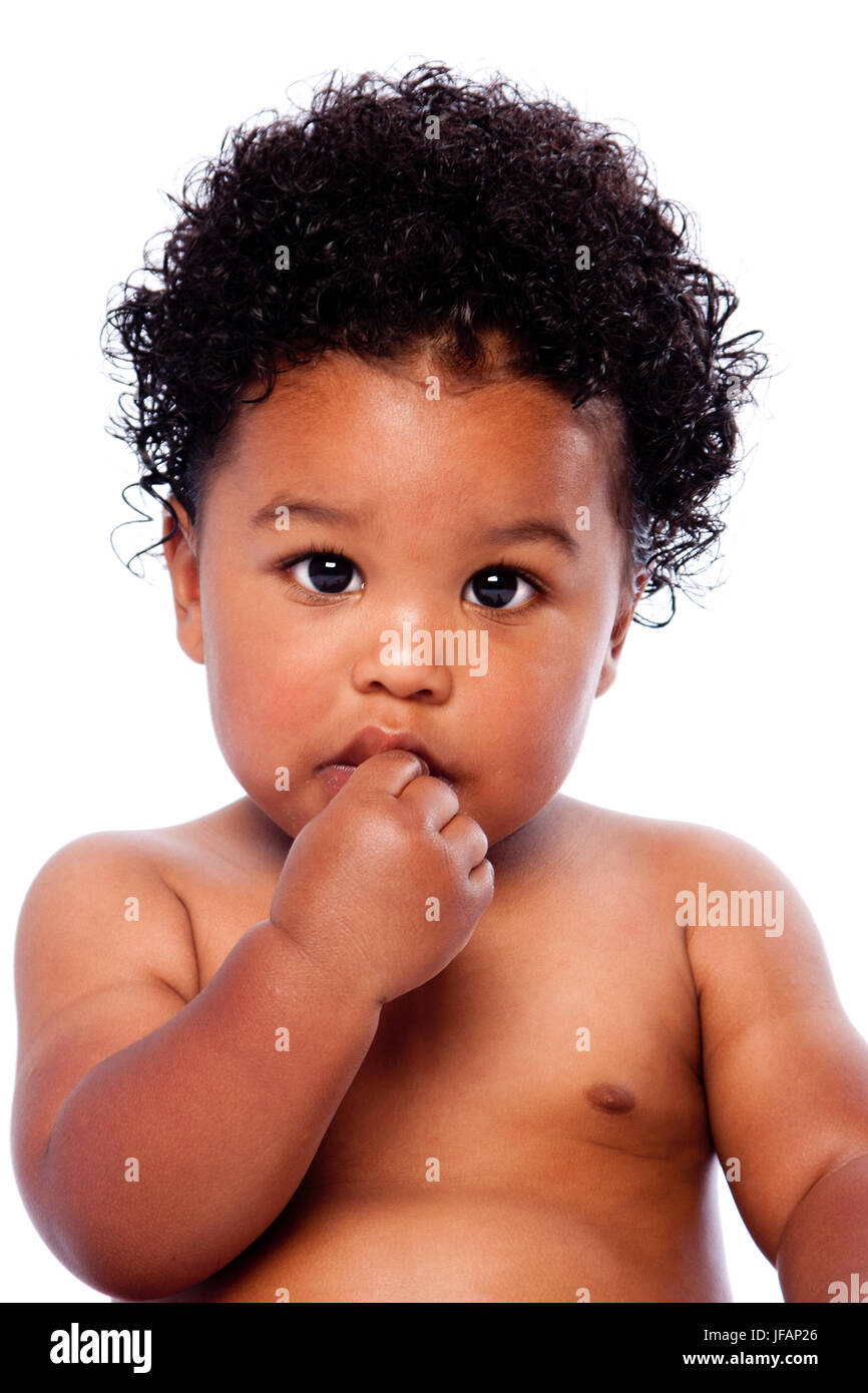 Cute Adorable Beau Bebe Tout Petit Visage Avec La Main Dans La Bouche Et L Expression Innocente Et Cheveux Boucles Photo Stock Alamy