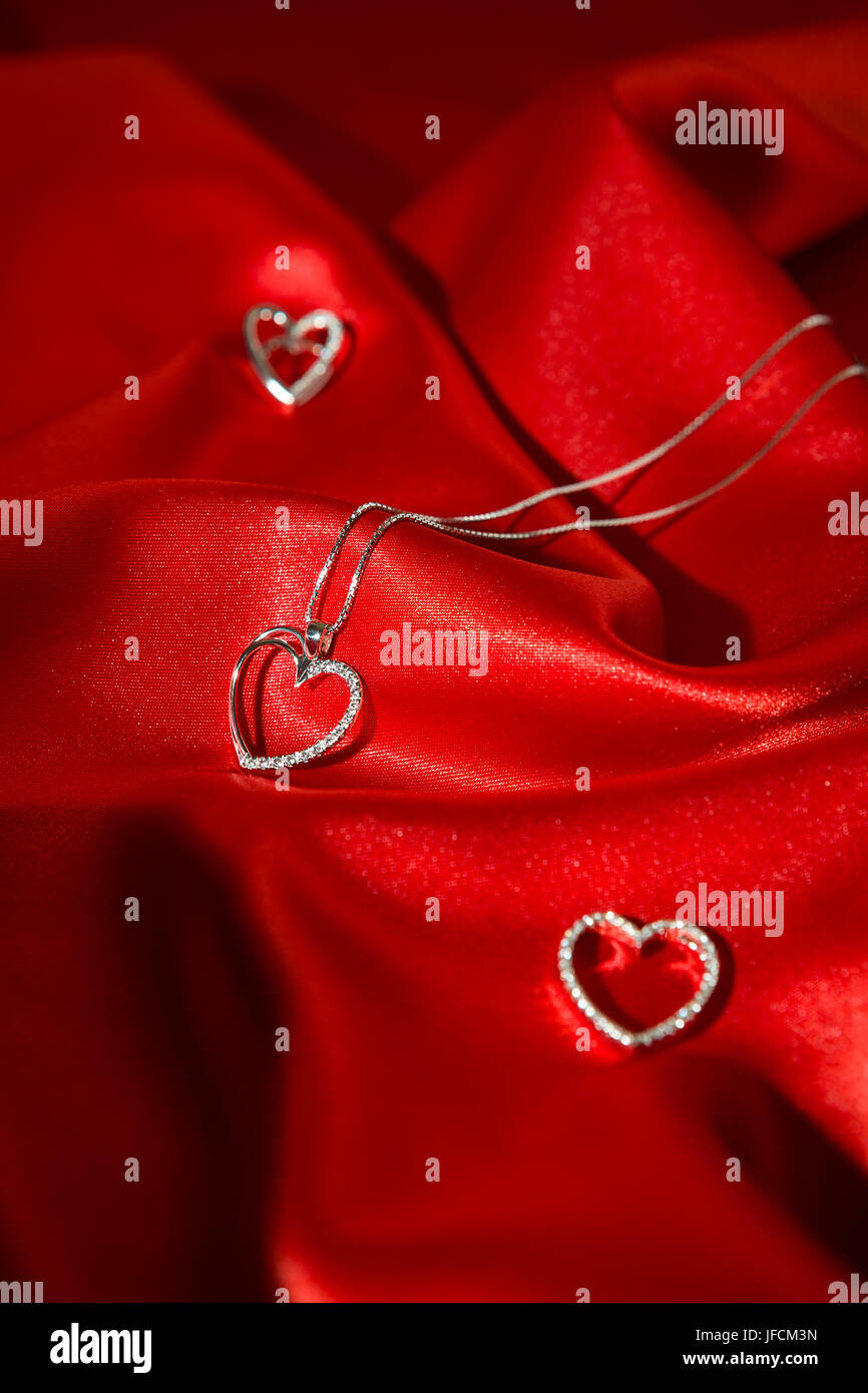 Pendentifs coeur argent Banque D'Images