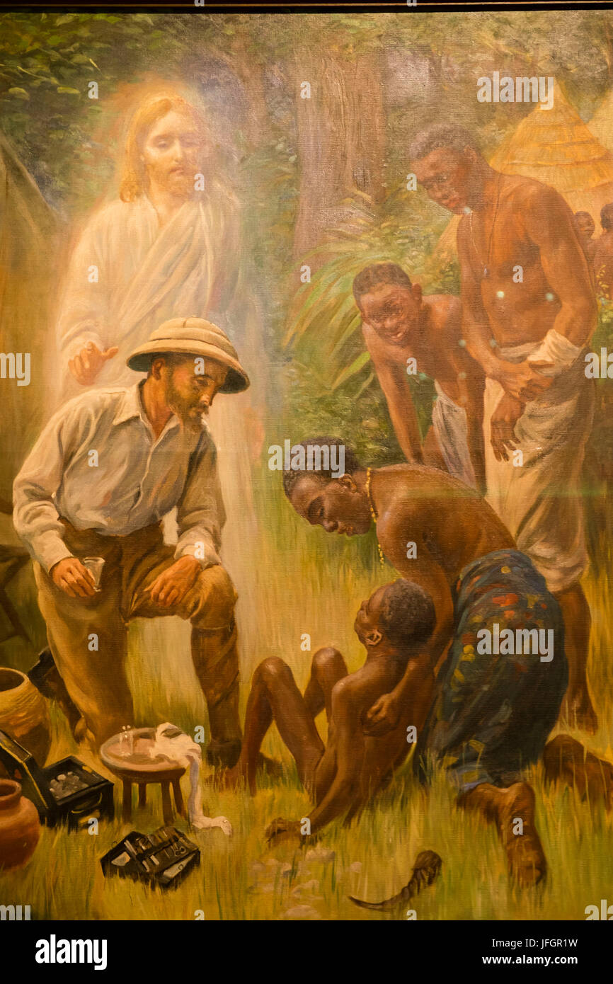 L'Angleterre, Londres, The Wellcome Collection, la salle de lecture, la peinture intitulée "Un missionnaire médical à un malade des Africains par Harold Copping, 1916 Banque D'Images