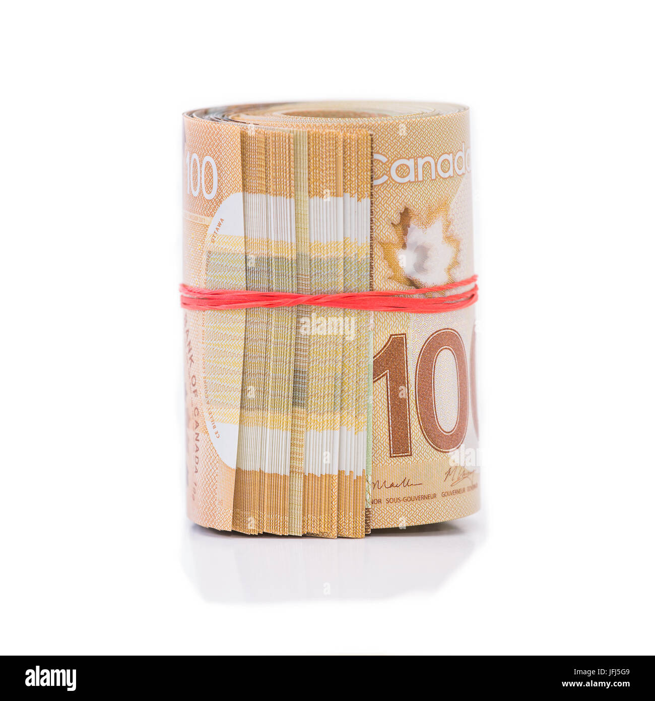 Rouleau de billets de banque canadiens wraped avec une bande de caoutchouc Banque D'Images