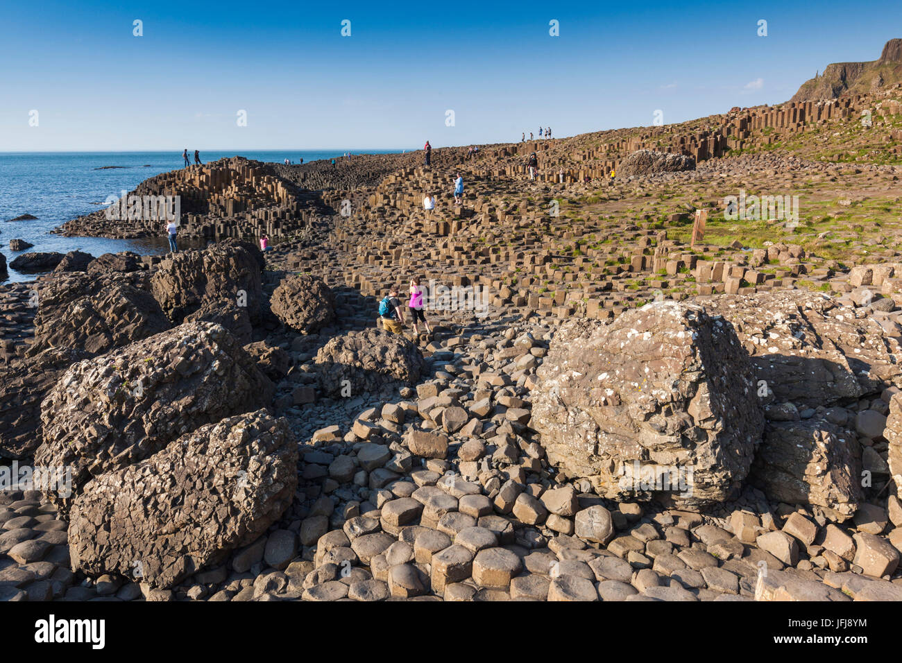 Royaume-uni, Irlande du Nord, le comté d'Antrim, Bushmills, Chaussée des Géants, site classé au Patrimoine Mondial de l'Unesco, coastal rock formation de basalte, crépuscule Banque D'Images