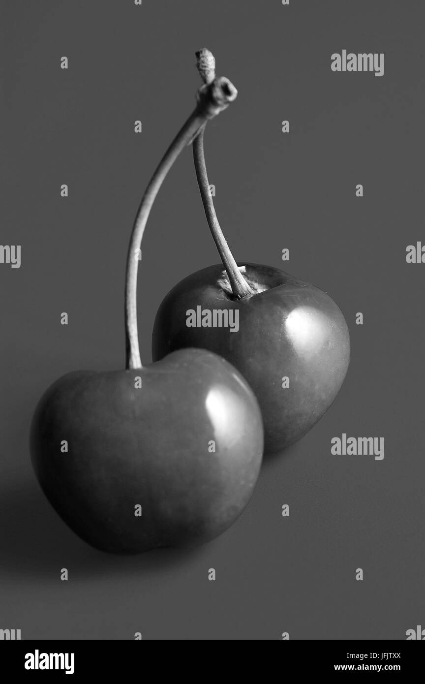 Deux cherry isolé sur gris, Banque D'Images