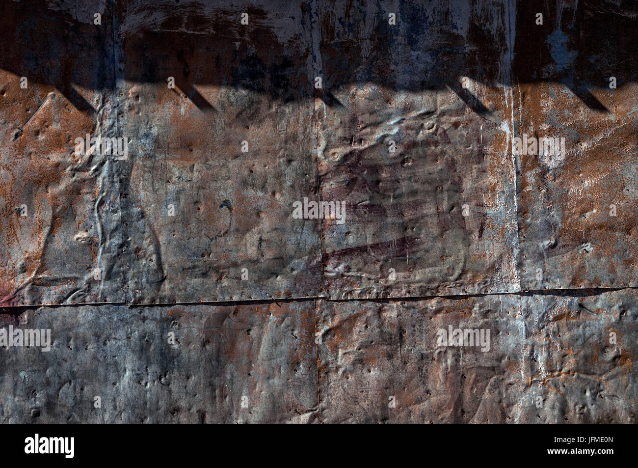 Symbole / Concepts, le fer rouillé mur de la vieille grange Banque D'Images