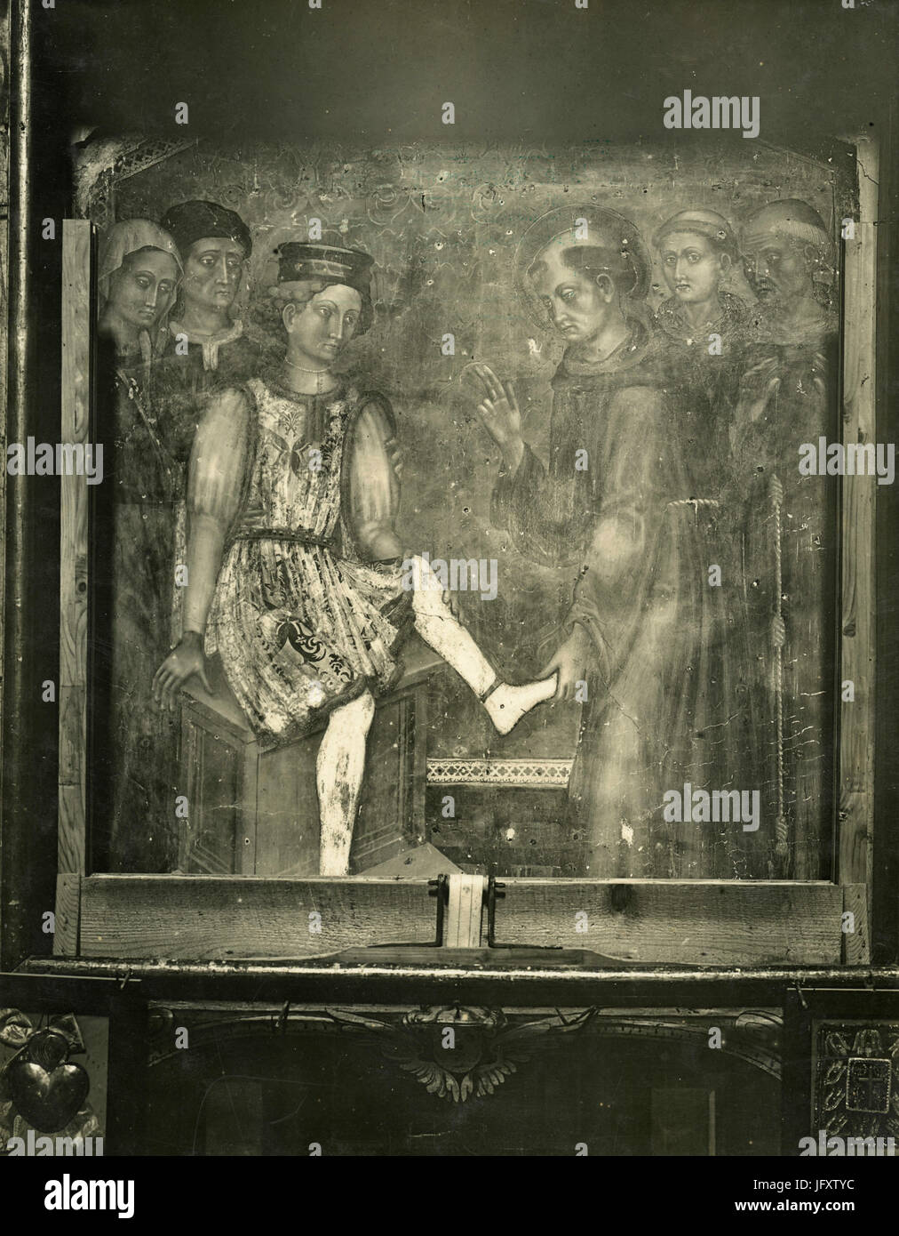 Saint guérissant un pied, peinture de l'École de Gentile Da Fabriano, Recanati, Italie Banque D'Images