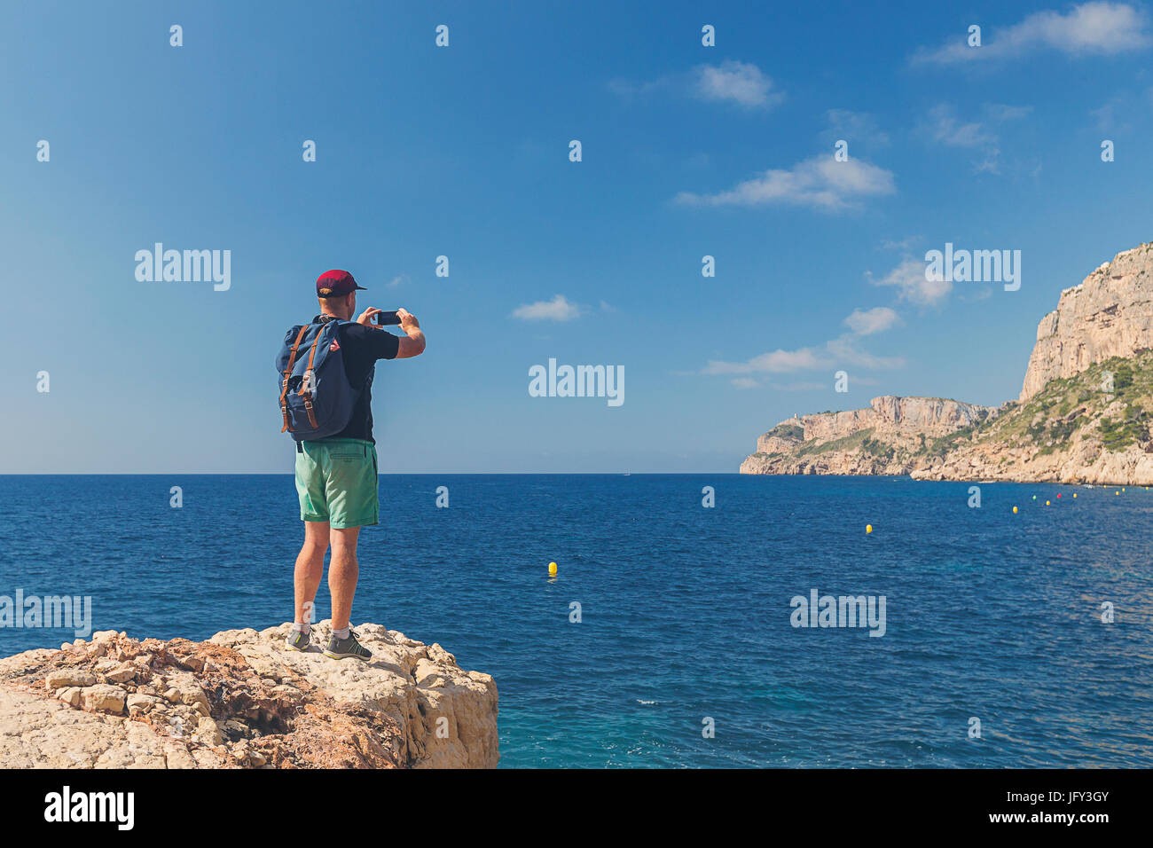 La prise de photo sur littoral adultes Banque D'Images