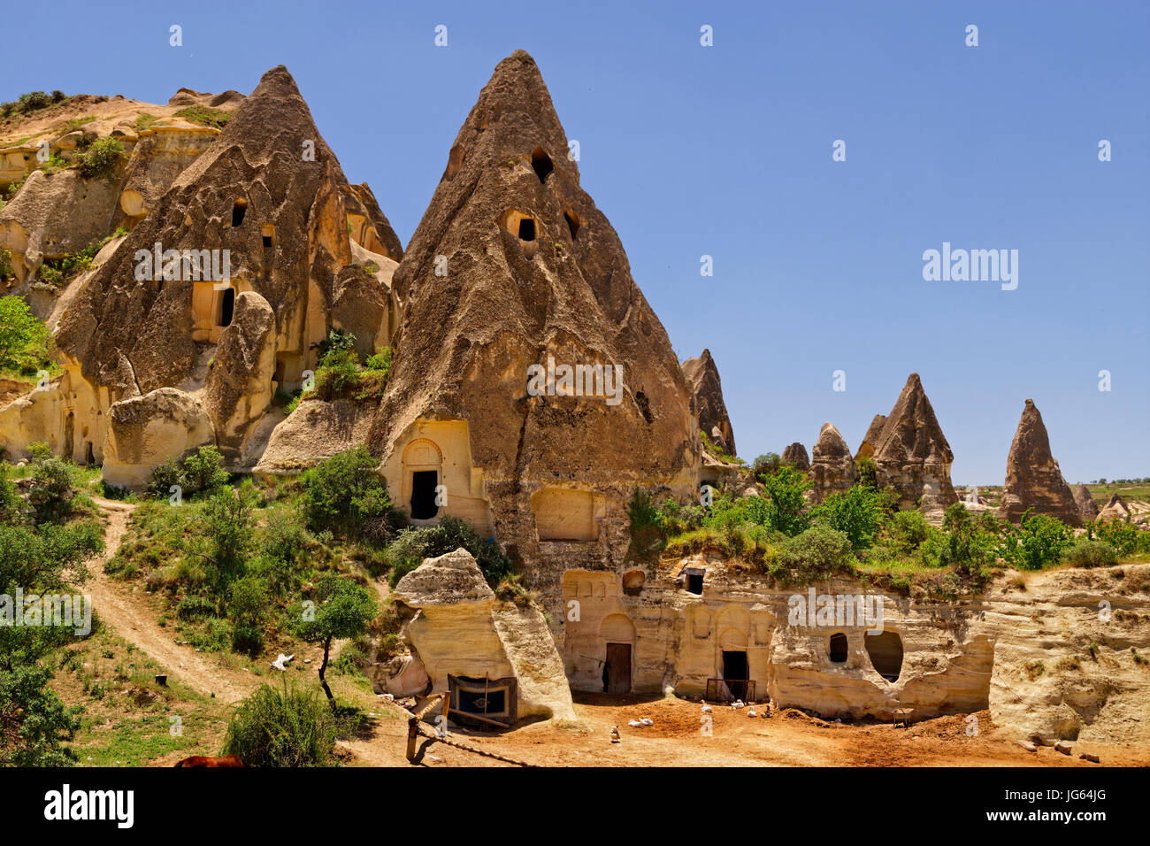 Des habitations troglodytiques occupés à Parc national de Göreme, Cappadoce, Turquie. Banque D'Images